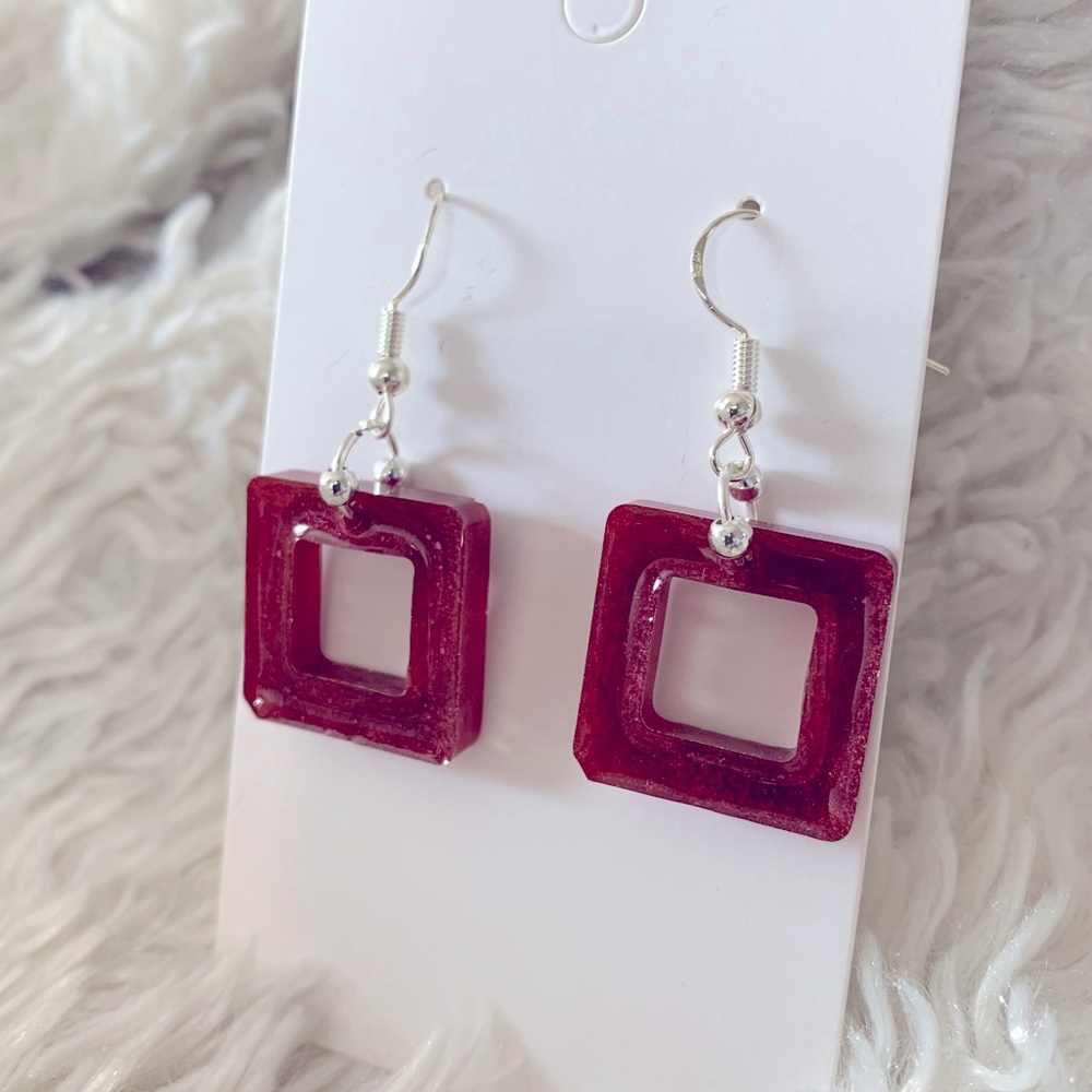 Dangly silver and maroon earrings